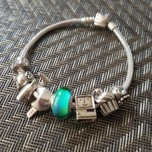 Ohm beads bracelet full of charms